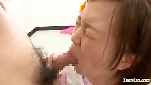 She takes his cock in and out of her mouth, spreads her legs and thrusts it into her shaved pussy.