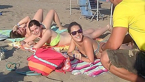 Spanish chicks seduced on a beach